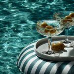 PromptClose up of two elegant martini glasses...