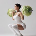 Всё не по технике, но зато нет калорийных блинов A fit woman in a white fitness ...