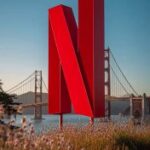 Prompt:Big Netflix logo floating in the sky...