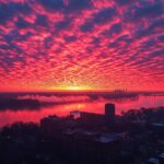 City sunset evening river sky clouds#AI #artificial...