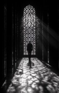 In the shadows of an ancient mosque, I stood alone in darkness and quietude, gaz...