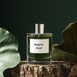 A white label on the bottle reads "Mojave Ghost" in the style of Redo. The text ...