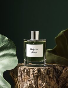 A white label on the bottle reads "Mojave Ghost" in the style of Redo. The text ...