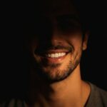 پرامپت دختر / پسر  / پسر  Ultra realistic dramatic low light...