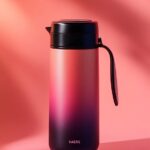 Product design: The bottle shape is cylindrical with a handle at the top of the ...