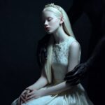 a melancholic unearthly attractive albino goddess with pale skin in a elegant dr...