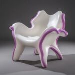 A chair made of white fabric and pink resin, is placed on an isolated gray backg...