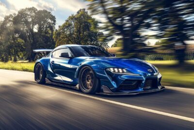 front side view of Toyota JDM with wide body kit, 22-inch wide-body wheels, blue...