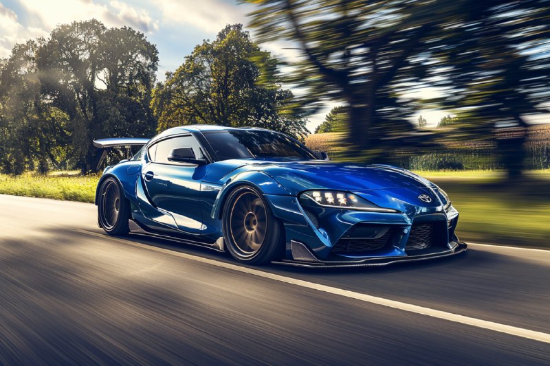 DmeKPjvf525EZl8GES8IeODAFScMhQOr6Vs7wrhApS7HZZ7Vt2LMFdcyaMbVxyGbKFcm6I49DVRVv9GBaFCFKh8go3p5SEZG5We.jpeg front side view of Toyota JDM with wide body kit, 22-inch wide-body wheels, blue...