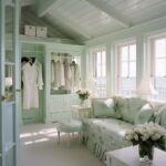 Lady's dressing room in seaside house, decorated in white, pastel green, blue, i...