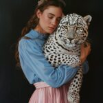 Со своими кисамиa woman with blue long sleeve and pink skirt hugging white leopa...