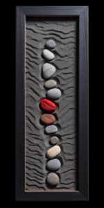 Pebble art, black background, minimalistic, a series of footprints in the sand l...