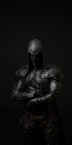 a male model human black lacquer face covered in black leather with black stitch...