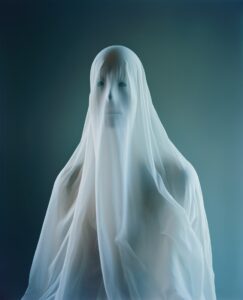 A portrait of a sheet ghost, kodak medium format film photography by rankin, mam...