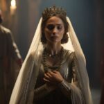 Cine still, portrait shot, a beautiful queen Demetra in throne receiving bad new...