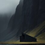 a building in front of a mountain side, in the style of organic minimalism, dark...