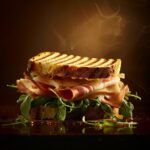 still life photographic shot, sandwich made with two slices of pan bauletto, stu...