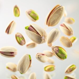 Giant pistachios floating in the white background --v 6by gloria140684#food Prom...
