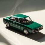 The light and shadow of the half-dark green Matchbox Alfa Romeo Giulia Sprint GT...