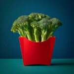 studio photography of a single red fast-food cardboard box that is typically use...