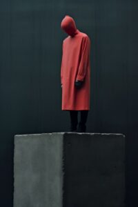 Portrait of linen spectre standing on a concrete cube, frightening appearance, l...