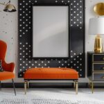 ultra realistic vertical picture frame mockup hanging on a wall over a orange an...