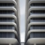 a huge building in paris with a large facade, in the style of experimental cinem...