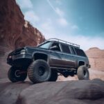 V5 Promptpolished steel GMC 2000 Suburban built for rock crawling stands on conc...
