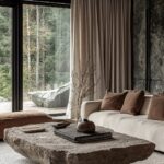 A cozy living room with earthy tones, featuring an oversized stone coffee table ...