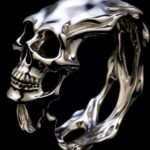 Silver skull/ skelton cuff, etsy, in the style of expressionistic distorted form...