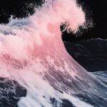 Pink and white gradient sea wave, black background, night sky, minimalism, surre...