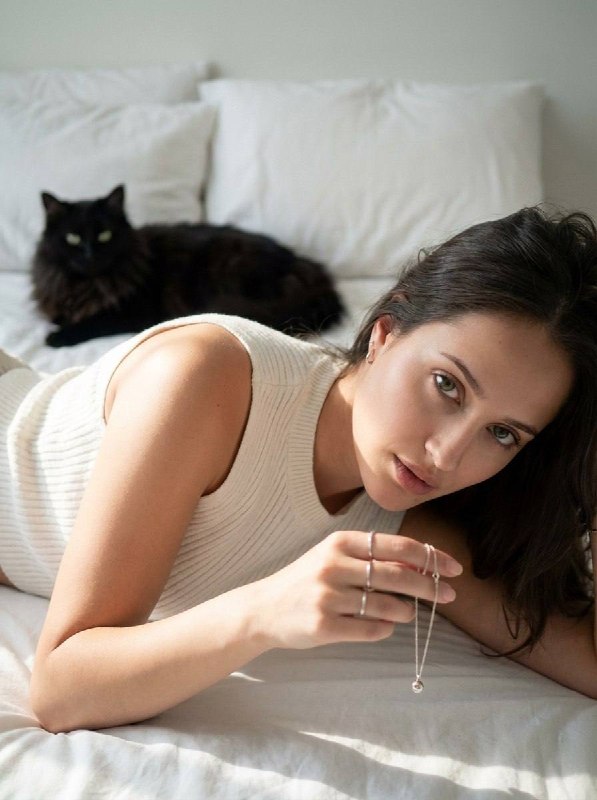 An intimate editorial photograph of a person...